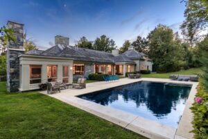 Pool home with custom steel windows and doors by Optimum Window