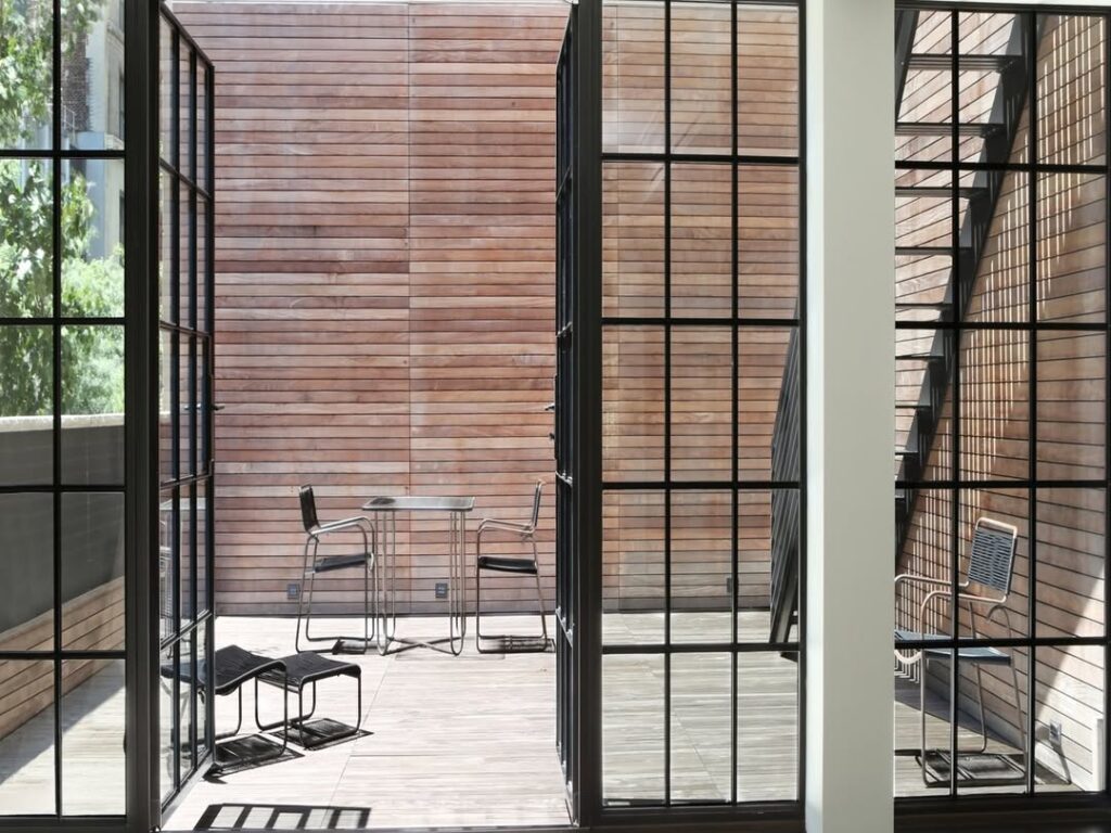 Brooklyn brownstone with custom steel window and doors systems by Optimum Window